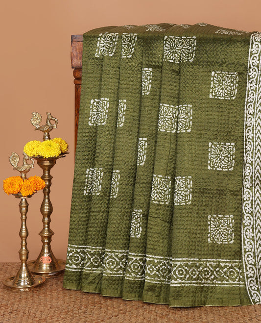 Olive green batik-printed square motifs Litchi crushed saree, batik-printed border & pallu of geometric & floral batik print