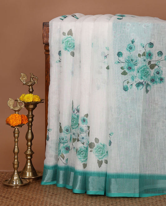 White rose floral printed linen saree, contrast silver bavanji border, floral printed pallu & floral printed green blouse
