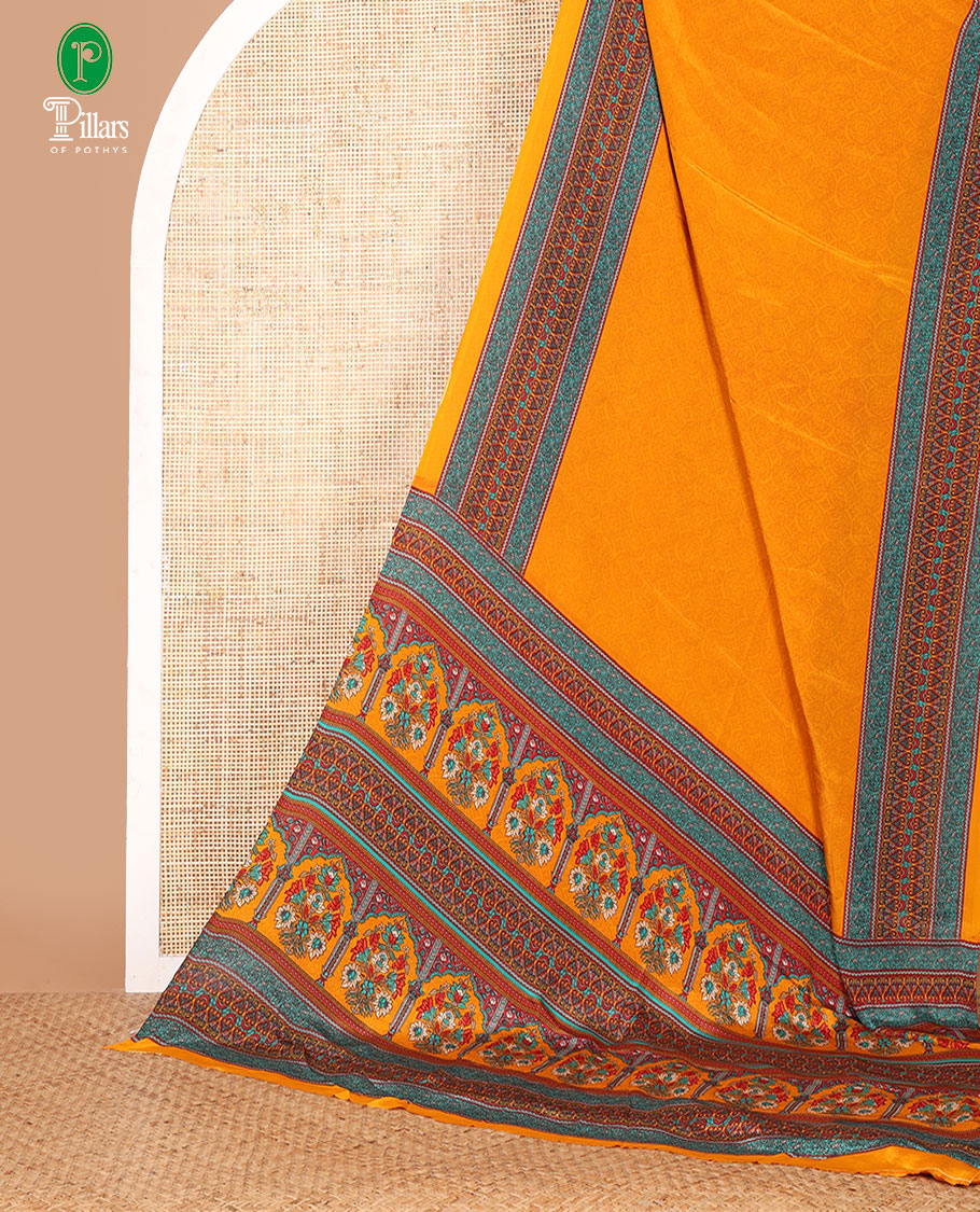 Mustard negative-style sparsely printed crepe silk saree, contrast printed border, printed pallu & printed blouse