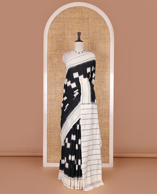 Black and white checked blocks patterned ikkat cotton saree, contrast plain border, striped pallu, and contrast plain blouse