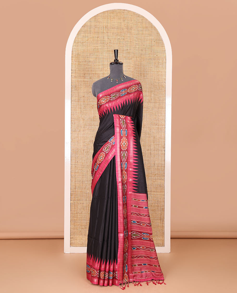 Black plain Katan silk saree, contrast temple ikkat floral printed border, ikkat floral printed pallu, and ikkat printed blouse