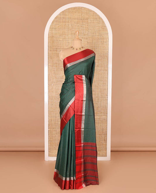 Bottle green thread plus buttas semi-soft silk saree, contrast striped satin border, striped pallu, and contrast plus buttas blouse