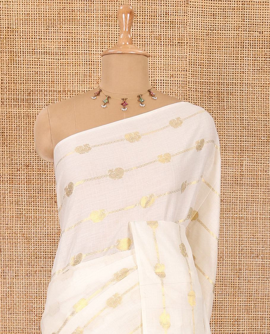 Borderless cream-ramar blue peacock and horizontal zari striped Kerala cotton saree, self-pallu with tassels, and a matching blouse