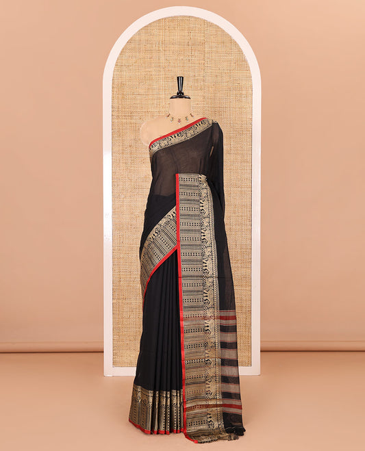 Black plain mercerised cotton saree, contrast traditional motifs thread woven border, striped pallu, and a matching blouse