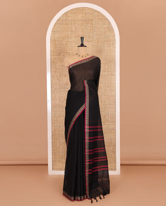 Black plain mercerised cotton saree, contrast temple traditional border, striped pallu, and a matching blouse