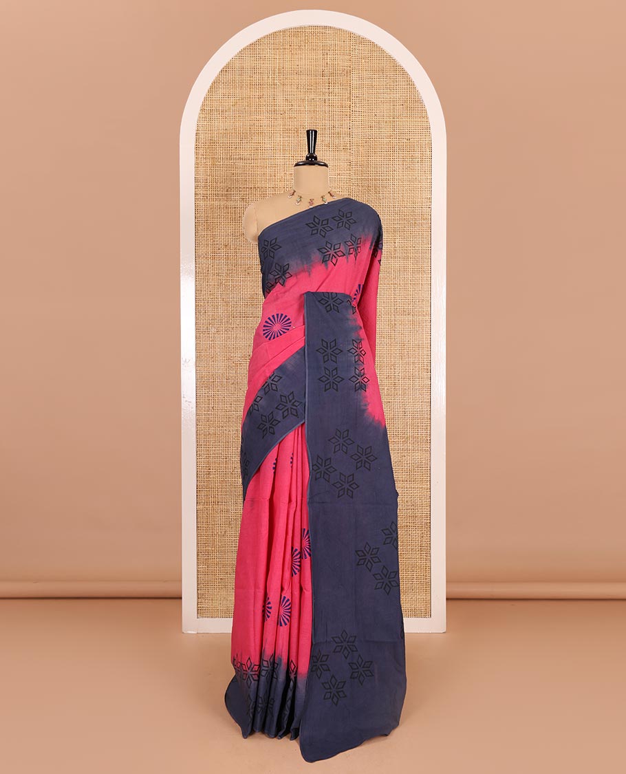 Pink sunbrust motifs block printed mul cotton saree, contrast floral motifs block printed border, block printed pallu, and contrast plain blouse
