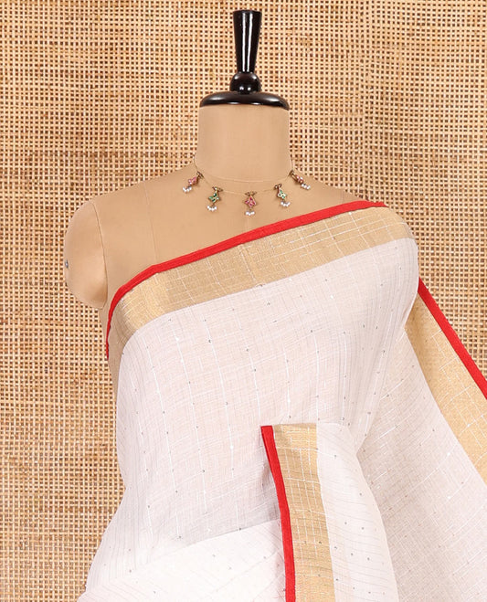 White and red sequins striped Linen cotton saree, contrast zari sequins striped border, striped pallu, and a contrast plain blouse