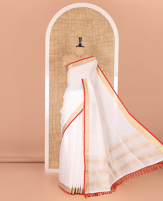 White and red sequins striped Linen cotton saree, contrast zari sequins striped border, striped pallu, and a contrast plain blouse