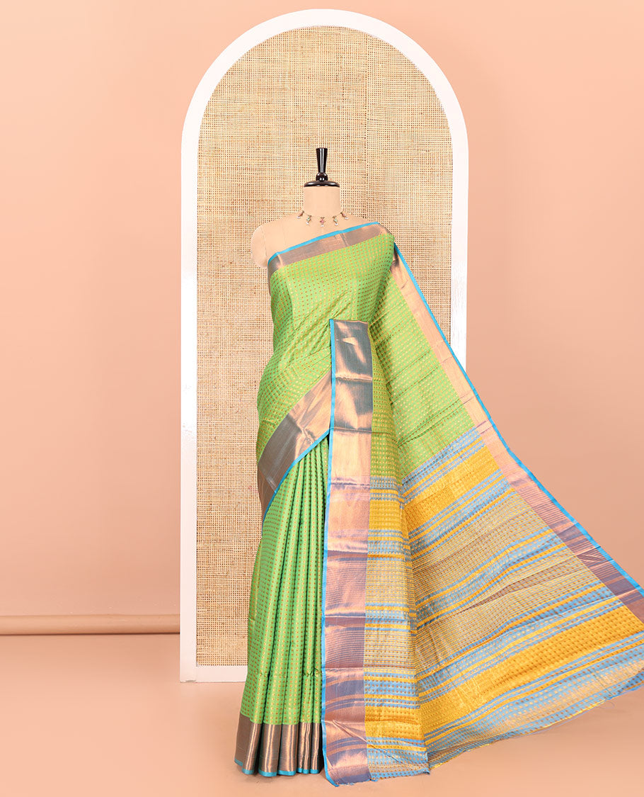 Parrot green zari buttas semi-soft silk saree, contrast plain zari border, contrast zari buttas steeped pallu, and a contrast zari design blouse