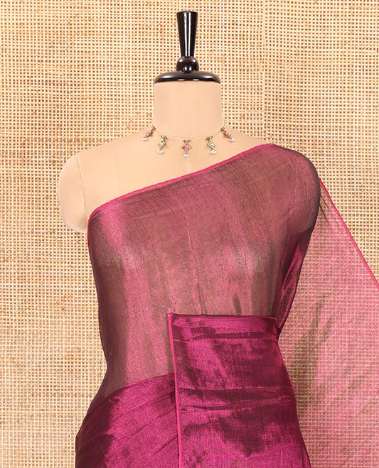 Borderless magenta plain khadi tissue saree self pallu with tassels  and a matching blouse