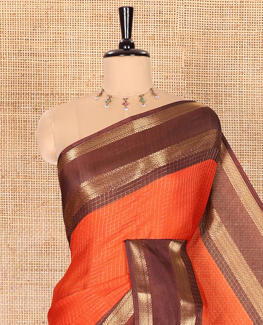 Rust Orange Zari Checked Moss Chiffon Saree Highlighted with a Contrast Rettai Pettu Traditional Zari Border, Colorfully Kalamkari Peacock Printed Pallu, and a Contrast Kalamkari Printed Blouse