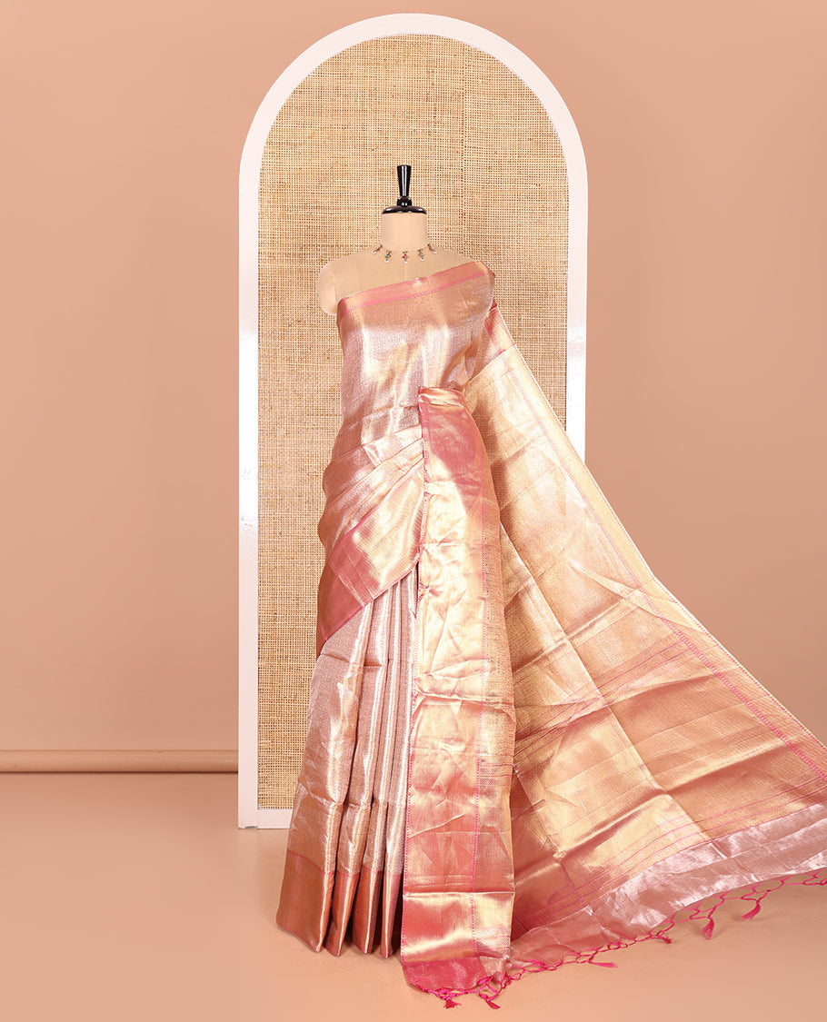 Pastel Pink Tissue Saree Features Floral Jacquard Design Woven All Over Its Body, Features a Contrast Gleaming Zari Traditional Design Border, Zari-Enriched Pallu, and a Matching Blouse
