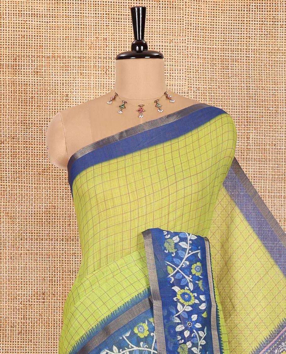 Parrot Green Linen Cotton Saree, Spotlighted with Medium-Size Checks on Its Body, Complemented by a Contrast Kalamkari-Style Floral Printed Border, Pallu of Big Kalamkari Peacock Print, and Paired with a Contrast Floral Printed Blouse