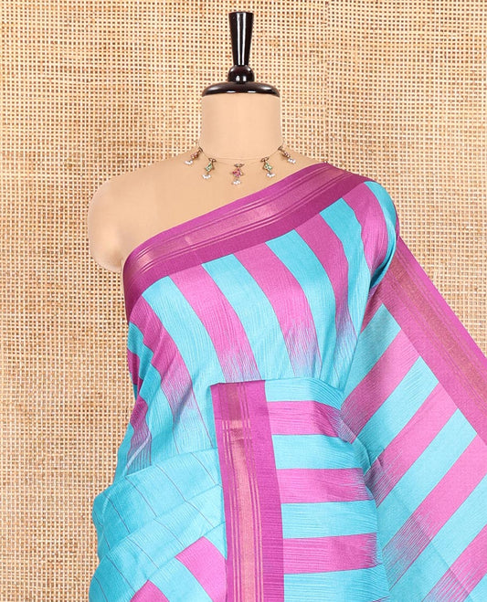 Blue Manipuri Silk Saree, Subtly Woven with Vertical Stripes All Over Its Body, Complemented by Contrast Zari Border, Sparsely Striped Pallu, and Paired with a Contrast Blouse