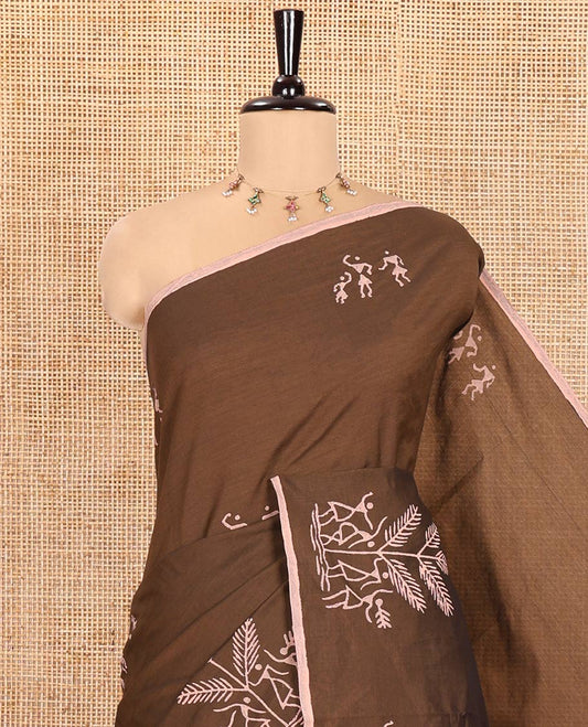 Brown South Cotton Saree, Embellished with Warli Motifs Handblock Printed All Over Its Body, Subtly Block Printed Border, Paired with a Matching Blouse, and a Contrast Floral Vine Block Printed Blouse