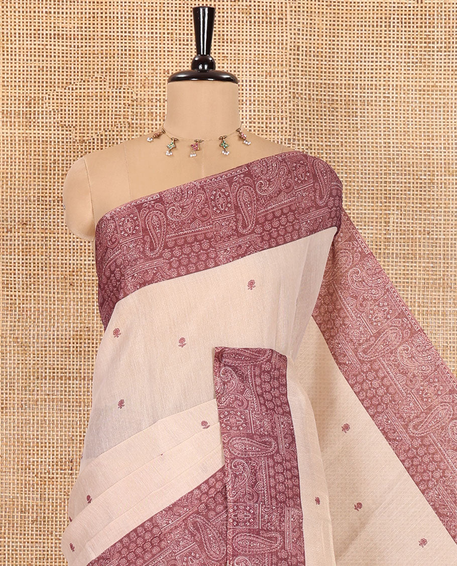 Chikku and Maroon Tissue Linen Saree, Delicately Printed with Floral Motifs on Its Body, Complemented by a Contrast Border of Paisley Designs, Pallu Steeped with Paisley Designs, and Paired with a Contrast Blouse