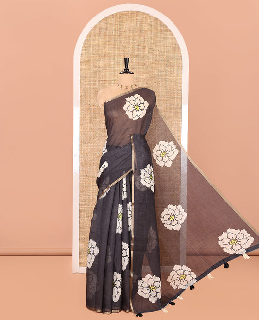 Black Linen Cotton Saree, Beautified with Flower Motifs Printed on Its Body, Subtle Piping Border, Self-Printed Pallu, and Paired with a Matching Blouse