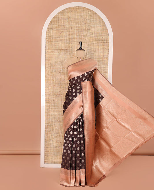 Brown and Peach Kanchi Silk Saree, Artfully Detailed with Zari Buttas All Over Its Body, Complemented by a Contrast Traditional Zari Rettai Pettu Border of Peacock-Chakram Designs, Intricately Designed Grand Pallu, and Paired with a Contrast Blouse