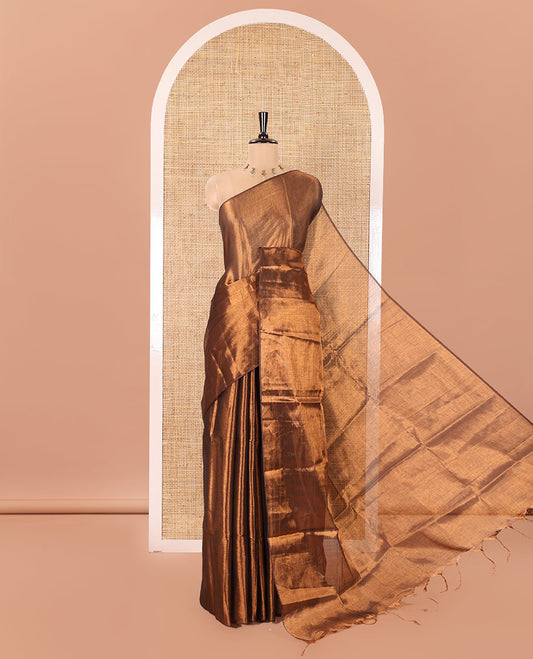 Borderless Copper Plain Khadi Tissue Saree, a Self-Pallu, and Paired with a Matching Blouse