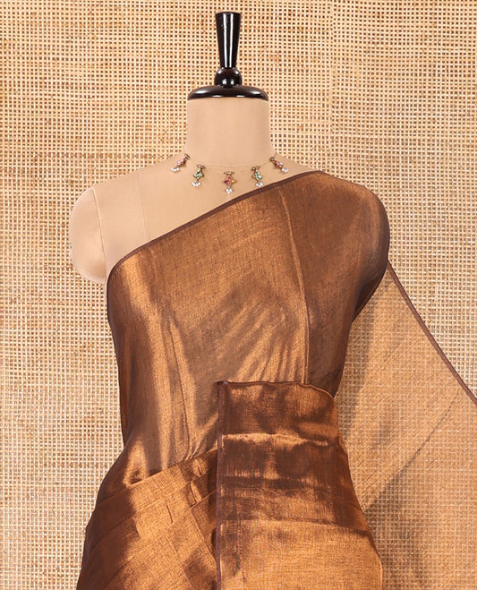 Borderless Copper Plain Khadi Tissue Saree, a Self-Pallu, and Paired with a Matching Blouse