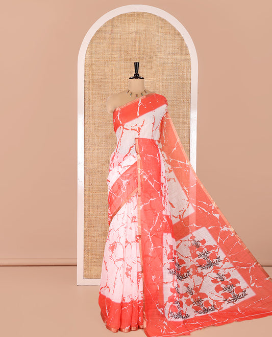 Cream and Red Linen Cotton Saree, Elevated with Batik Print on Its Body, Complemented by Contrast Batik Printed Border, Pallu of Floral Print, and Paired with a Contrast Blouse