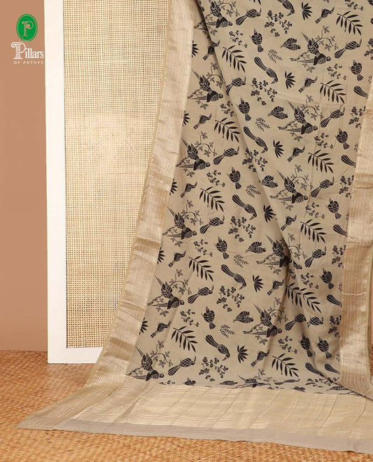 Chikku color birds printed assam silk saree with zari striped border & chit pallu along with butta printed blouse