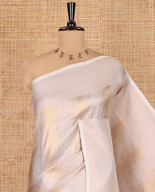 Cream Elite Soft Silk Saree, Gleamed up with Jacquard Design, Highlighted by Traditional Zari Border, Grand Pallu and a Matching Blouse