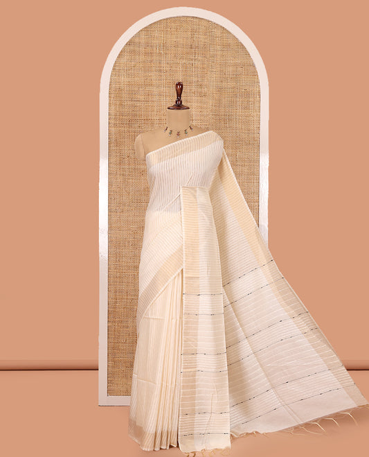 Cream Bhagalpuri Cotton Saree Features Vertical Stripes, a Zari Border, and a Matching Blouse
