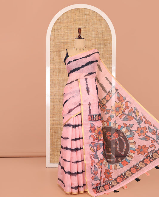 Peach Linen Cotton Saree, Adorned with Shibori Print, a Zari Piping Border, Floral-Peacock Motif Printed Pallu, and Matching Blouse