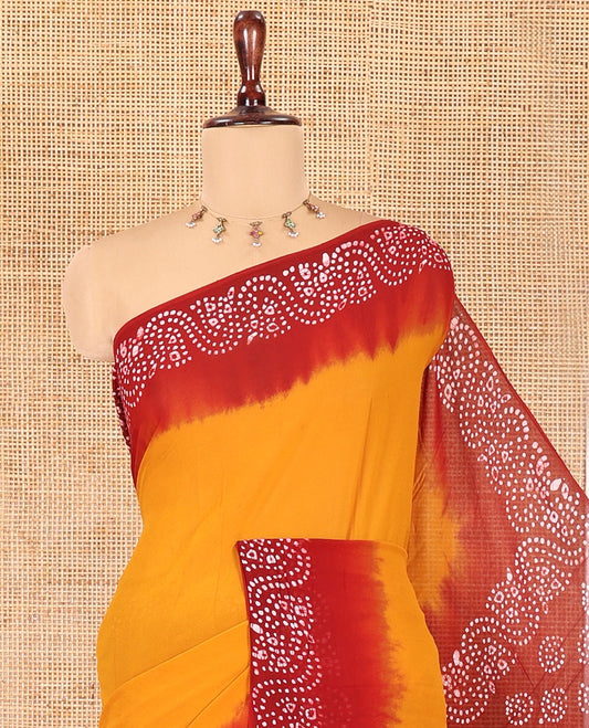 Black-Mustard Plain 60 Gm Georgette Saree, Contrast Batik Printed Border, Batik Printed Pallu, and a Matching Blouse