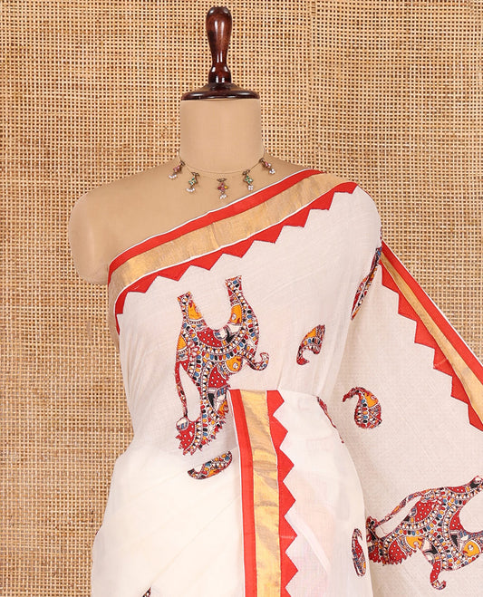 Cream-Red Kerala Cotton Saree, Elevated with Paisley-Horse Patch Applique Embroidery, a Contrast Temple Border, and Matching Blouse