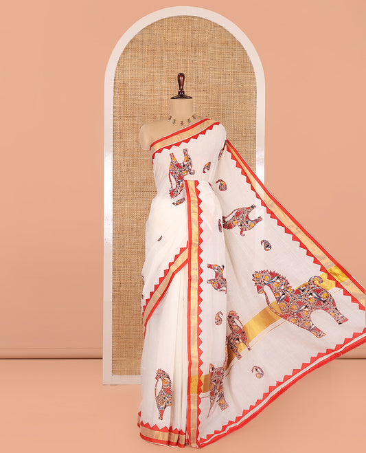 Cream-Red Kerala Cotton Saree, Elevated with Paisley-Horse Patch Applique Embroidery, a Contrast Temple Border, and Matching Blouse