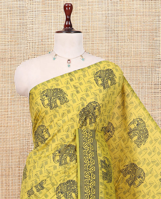 Yellow South Cotton Saree Features Leaf and Elephant Motifs Print, a Subtle Printed Border, and a Matching Blouse