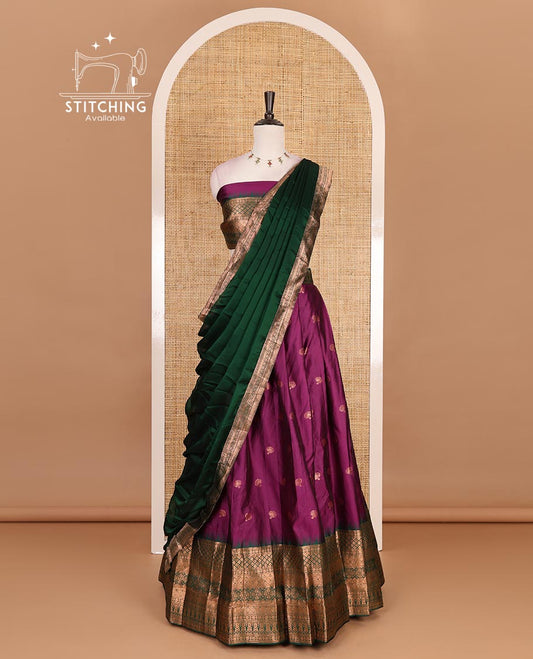 Purple taffeta silk half saree, zari buttas with contrast green traditional zari border, matching zari blouse, and contrast plain zari border dhavani