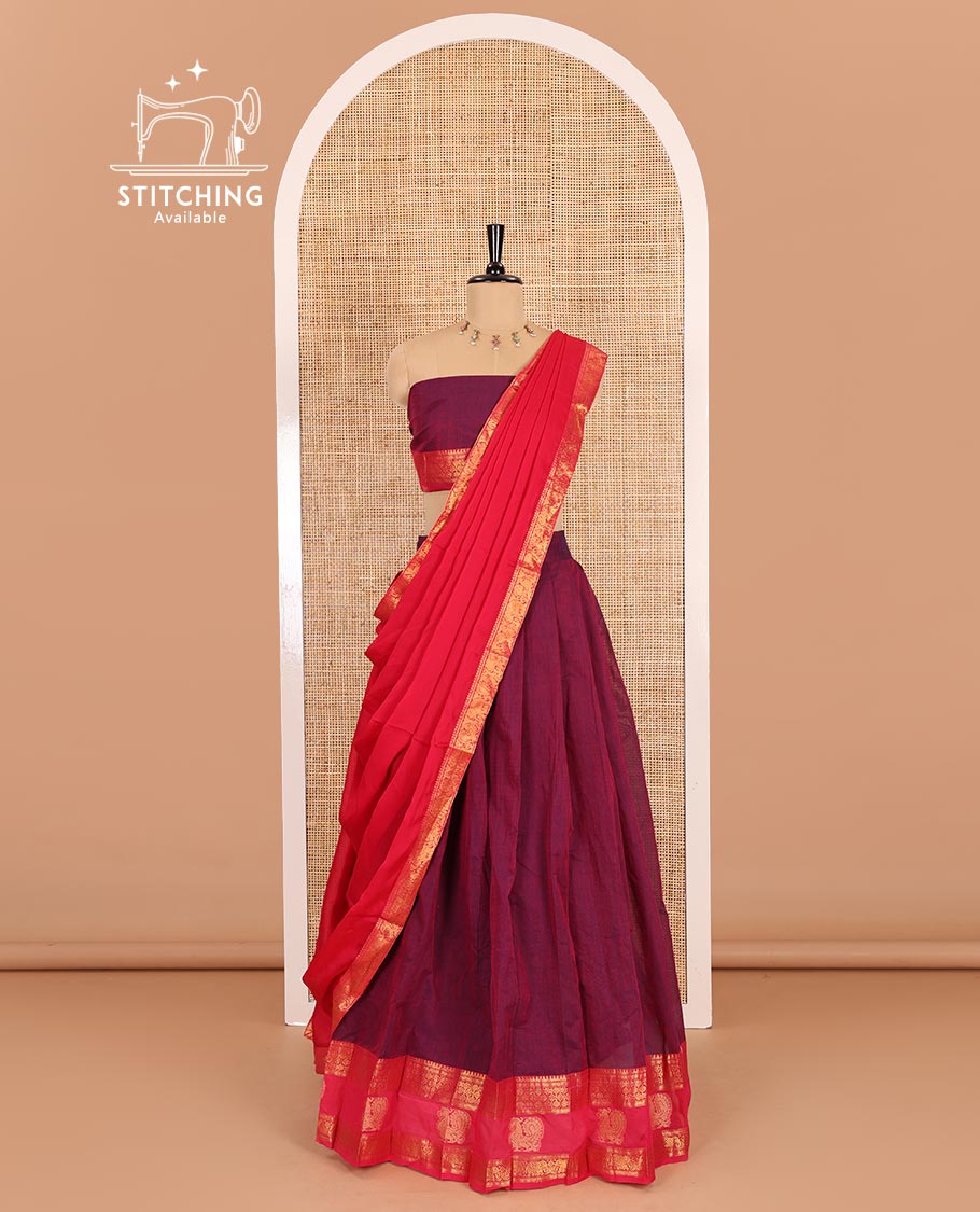 Majenta-rani pink sungudi cotton half-saree, plain with contrast traditional zari peacock motif bordered skirt, matching blouse, and a zari bordered dhavani