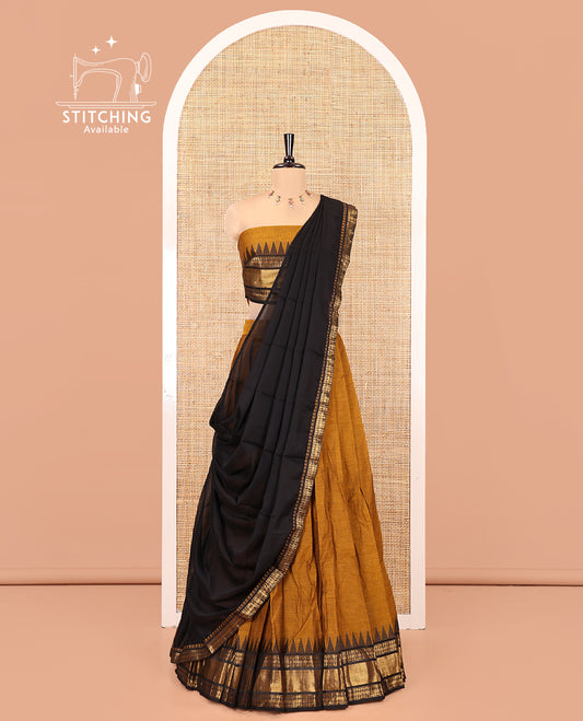Mustard-Black Chettinad Cotton Half-Saree Set Featuring a Plain Skirt, Contrast Temple Traditional Design Border, a Matching Blouse, and a Contrast Zari-Bordered Dhavani