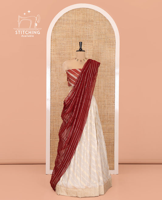 Cream-Maroon Semi-Banarasi Half-Saree Features Leheriya Striped Skirt, Contrast Leheriya Striped Blouse, Georgette Striped Dhavani