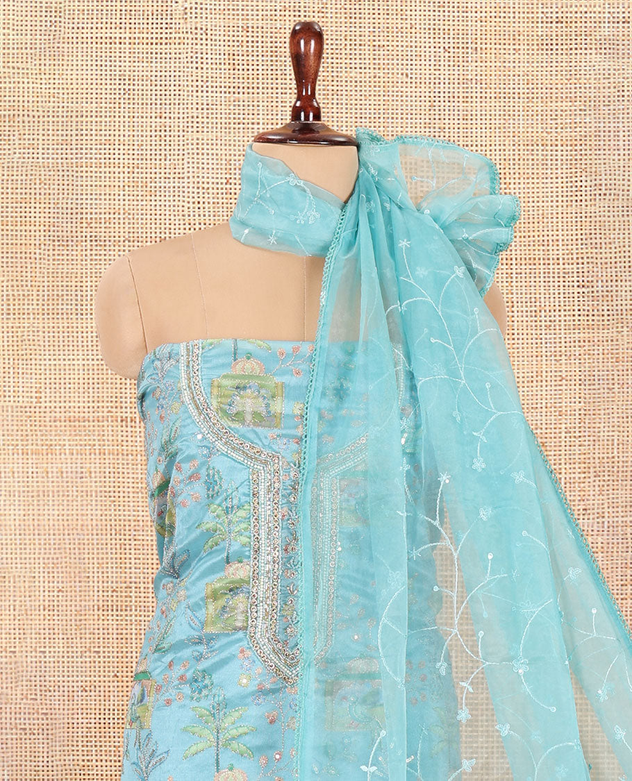 Sea Blue Organza Material Churidar, Intricately Printed Outlined Embroidery Top, a Matching Bottom, and a Floral Embroidered Dupatta