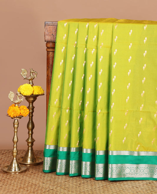 parrot green zari butta semi soft silk saree with rettai pettu, diamond border grand pallu along with plain blouse