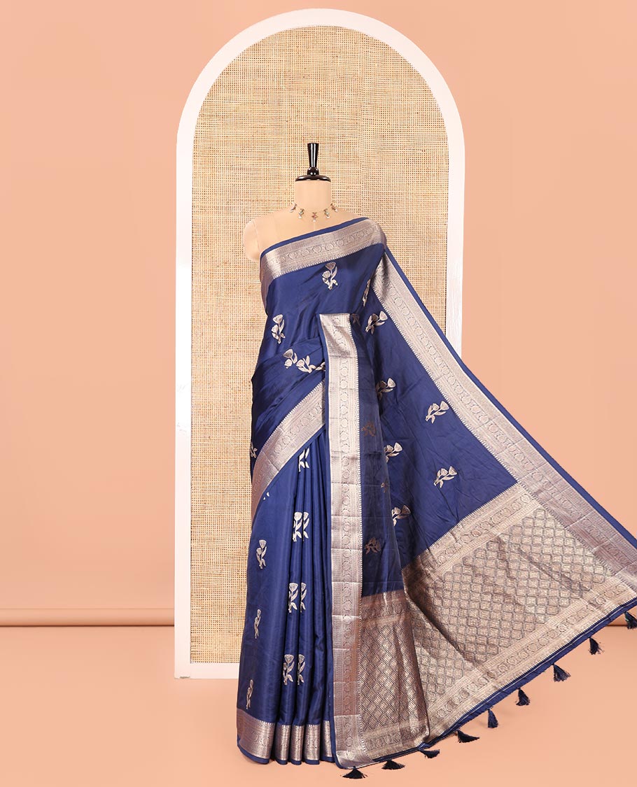 Navy Blue Semi-Banaras Satin Silk Saree, Dazzled with Floral Zari Buttas Across Its Body, Highlighted by Traditional Zari Design Border, Grand Zari Woven Palu of Jaal Designs, and Paired with a Matching Blouse