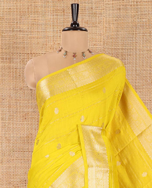 Yellow Assam Silk Saree, Featuring Horizontal Zari Stripes and Zari Buttas All Over Its Body, Highlighted by a Traditional Zari Border of Floral Creeper Designs, Zari-Striped Pallu, and Paired with a Matching Blouse