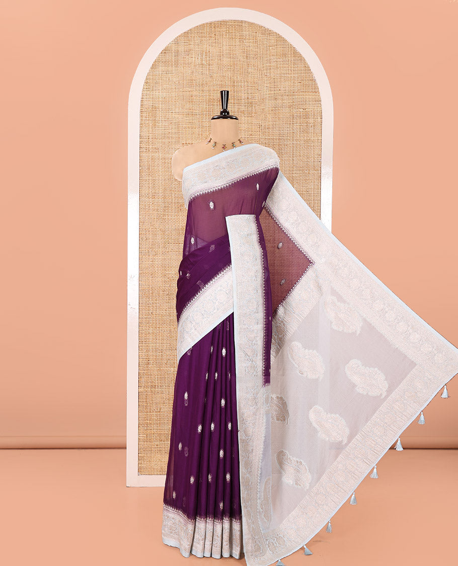 Purple Banaras Fancy Georgette Saree, Adorned with Zari Buttas All Over Its Body, Complemented by a Contrast Floral Creeper Zari Border, Pallu Features Paisley Designs, and Paired with a Contrast Blouse