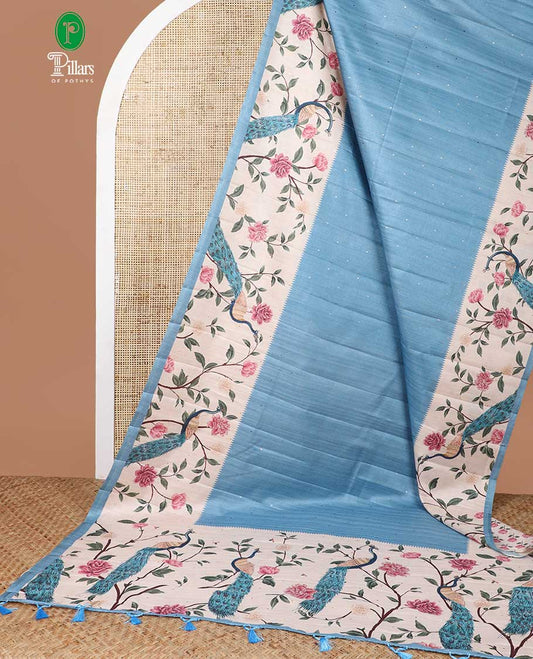 Sky blue  zari butta fancy tussar saree with peacock digital floral design border & digital print pallu along with floral print blouse