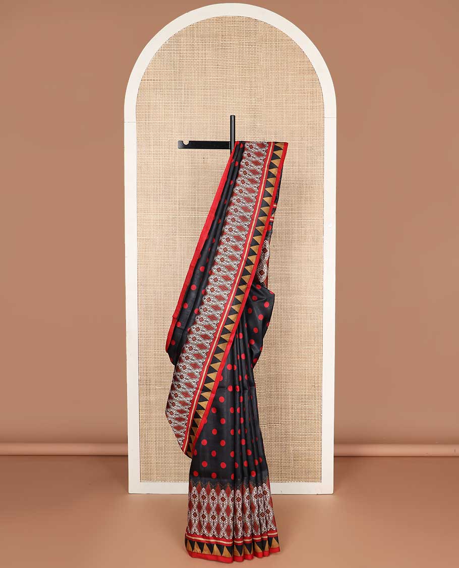 Black polka dot printed silk saree with contrast temple border & floral pallu