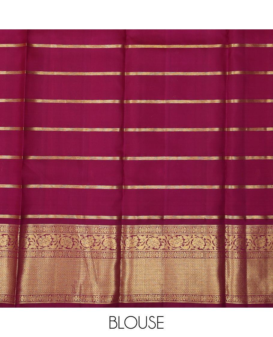 Orange pure-silk half saree, chakram butta enclosed checked skirt, contrast border & blouse of banaras,mayil kann & kodi visiry & intricate dhavani