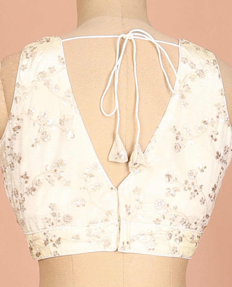 Cream floral vine thread embroidered & sequins work sleeveless readymade blouse with front and back deep-V neck