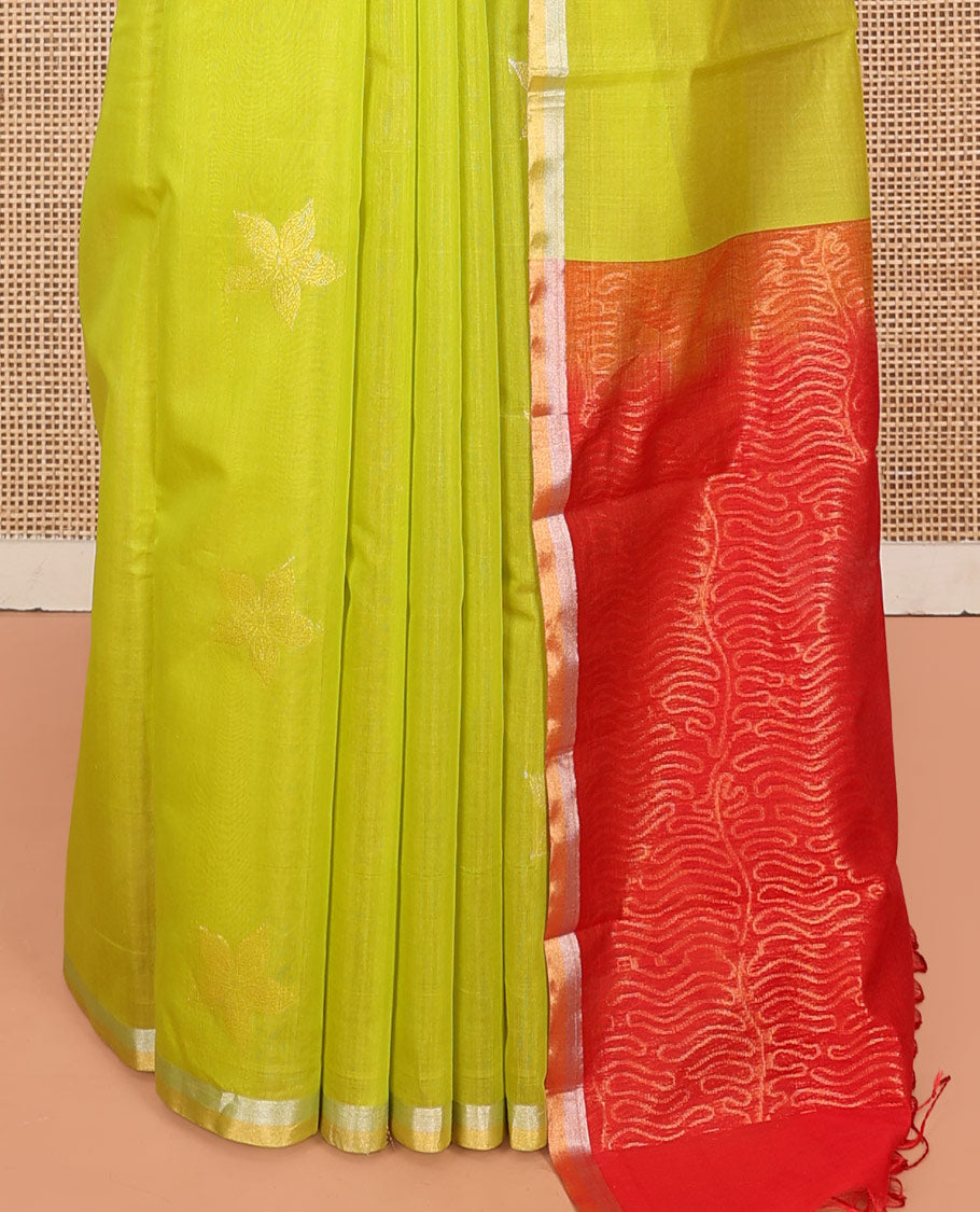 Leaf Green Silk Cotton Saree, Gleamed Up with Floral Buttas, a Subtle Piping Border, Contrast Pallu of Intricate Designs, and a Contrast Blouse