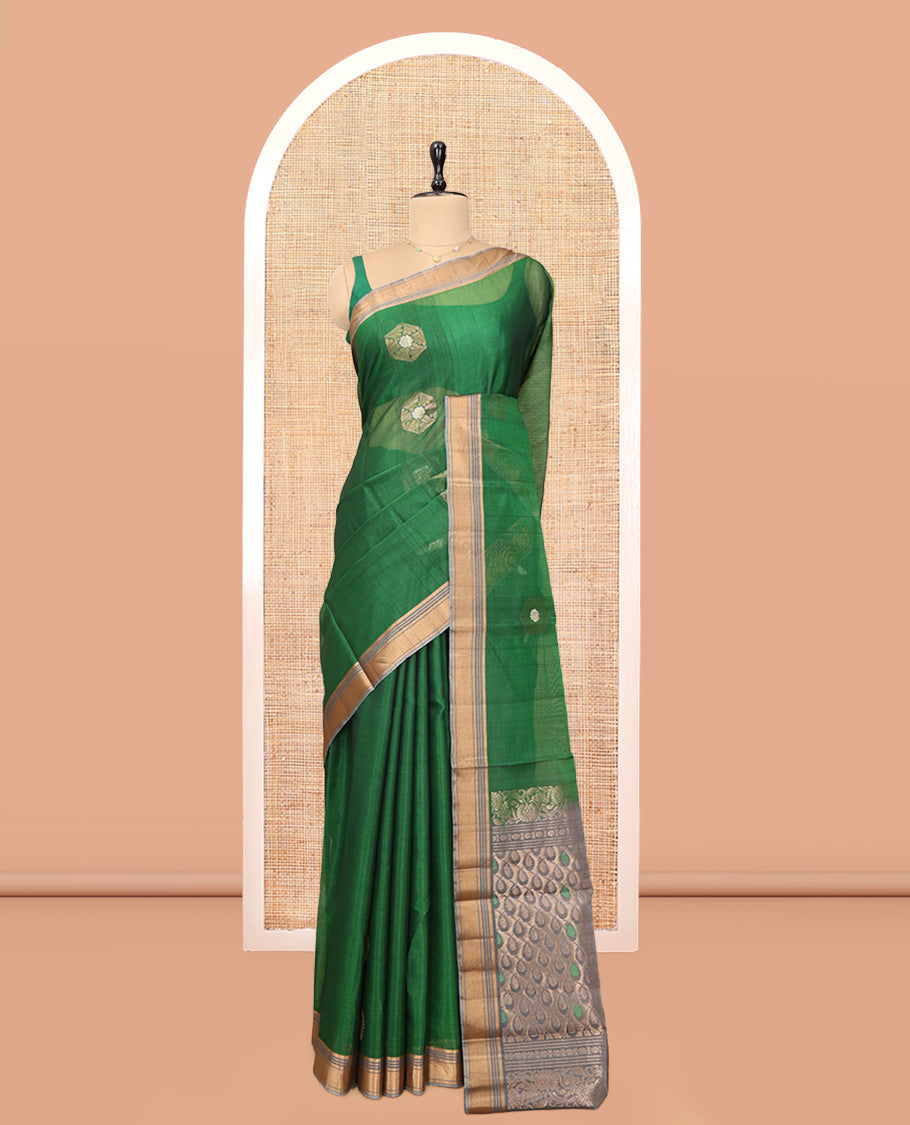 Green Cotton Saree, Highlighted by Zari Buttas, a Contrast Zari Border, an Intricate Pallu and a Contrast Blouse