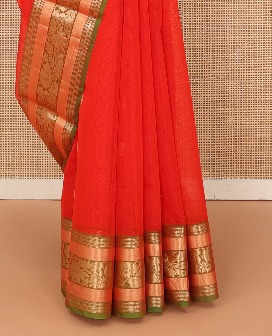 Orange zari buttas silk cotton saree, contrast traditional zari border of floral creeper design, and ogee patterned pallu
