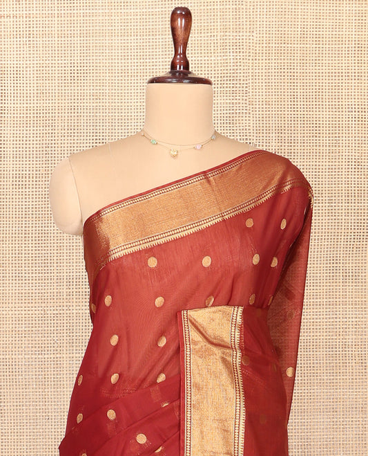 Rust Silk Cotton Saree, Highlighted by Zari Buttas On Its Body, Highlighted by Traditional Zari Border, Contrast Diagonally Woven Pallu and Paired with a Contrast Blouse